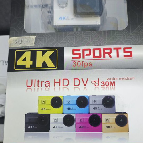 Action cam used, unknown if working, with caps, no cable