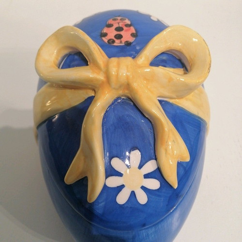 Vintage ceramic egg like new with lid and decorative details