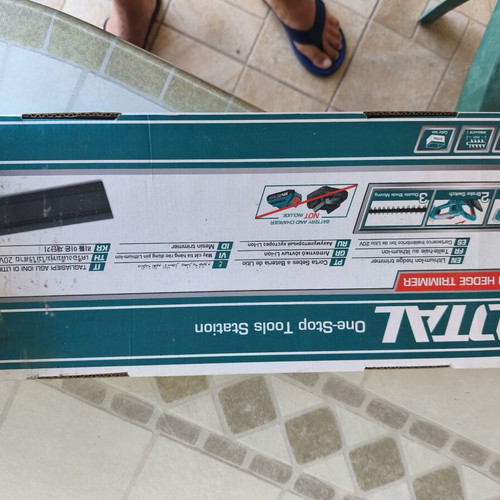 Total cordless hedge trimmer with battery and charger