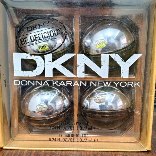 DKNY collectible empty Be Delicious miniatures used, set of 4 with wooden base