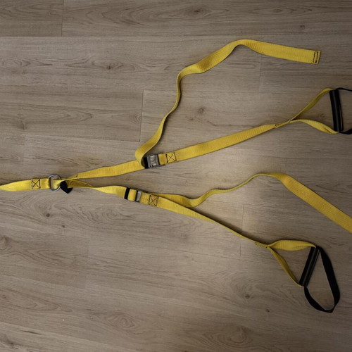TRX straps used, yellow color, without hook