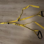 TRX straps used, yellow color, without hook