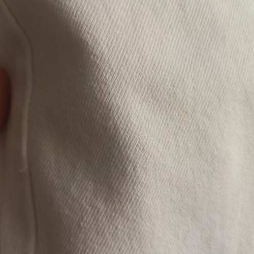 Sinsay white jeans with wide leg and pleated waist, size 40
