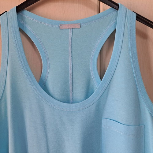 Sleeveless top new turquoise with pon pon
