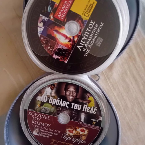 DVD collection like new, pack of 33 with movies, documentaries, and shows