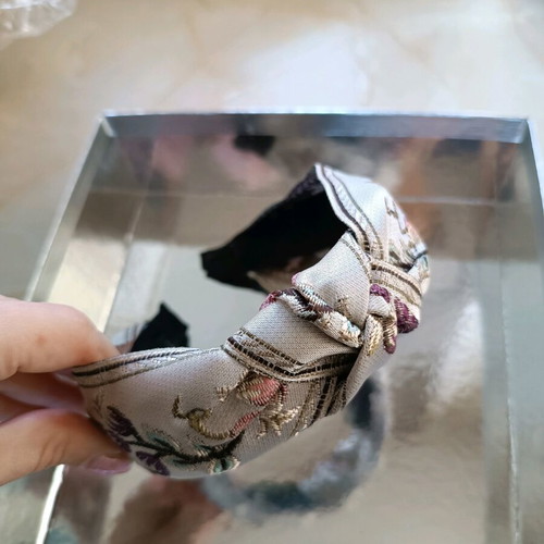 Hairband like new with embossed floral embroidered design