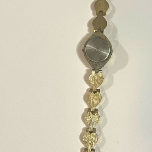 Quartz wristwatch used, gold color, women's