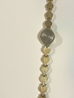 Quartz wristwatch used, gold color, women's