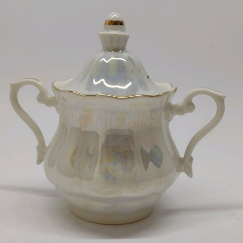 Porcelain sugar bowl with roses and gold trim like new