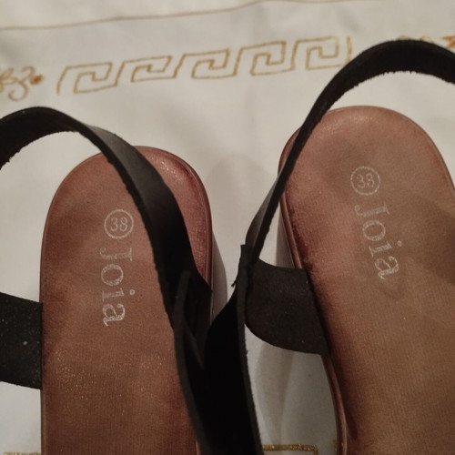 Sandal size 38 black and silver like new with strap and low heel