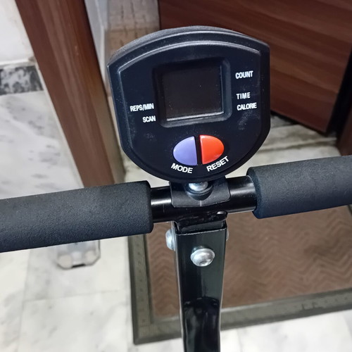 Elliptical rowing fitness machine