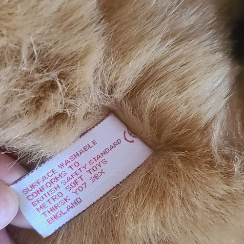 Plush dog like new, 58 cm long, English brand
