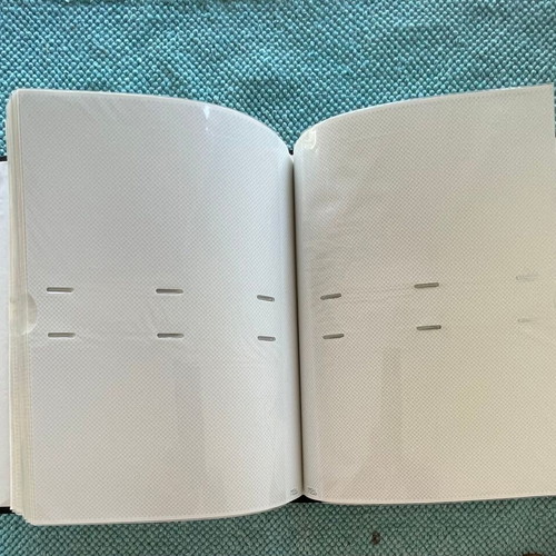 Photo album blue leatherette like new, holds 196 photos 10x15