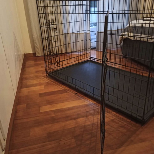 Large dog crate like new, foldable with two doors