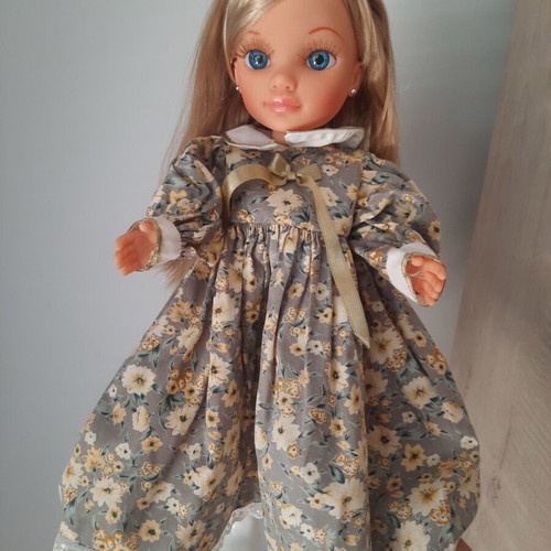 Nancy Famosa doll 2010 with 3 vintage dresses