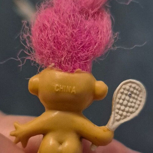 Vintage Troll figure with pink hair and tennis racket, used, rubber stamp base