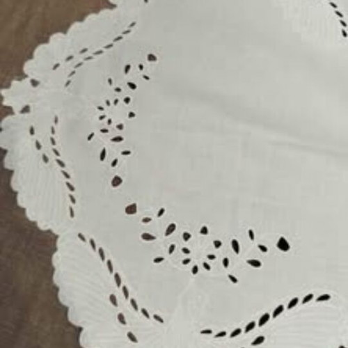 Embroidered square table linen with machine embroidery