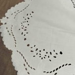 Embroidered square table linen with machine embroidery