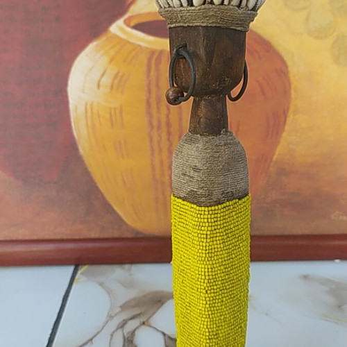 Namji African fertility doll handmade with wood, shells, cowrie, and yellow beads