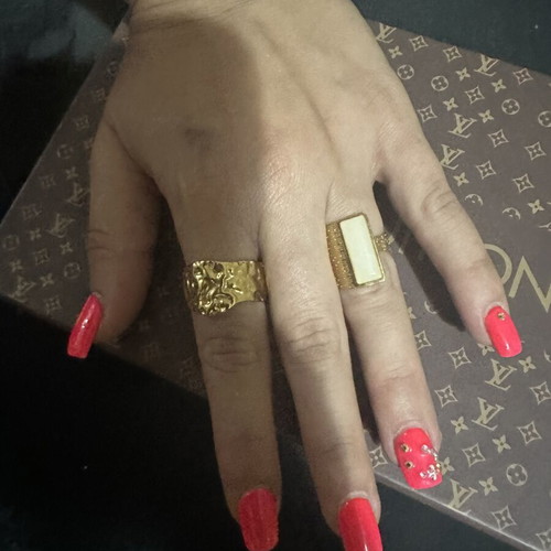 Steel rings like new, gold tone, set of two