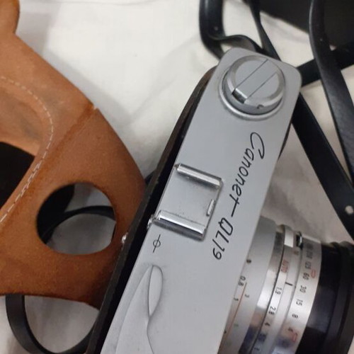 Canon Canonet QL19 camera used with flash and extra lens