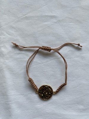 Handmade bracelet like new with beige and gold charm