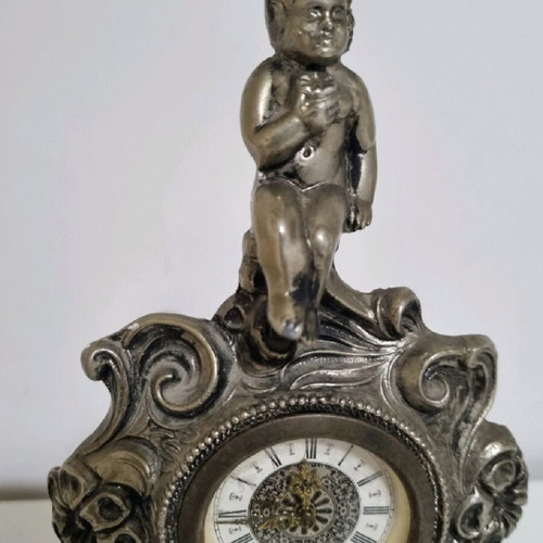 Antique clock used with German mechanism and porcelain decoration