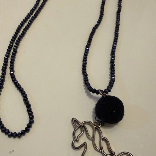 Women's necklace like new with unicorn design