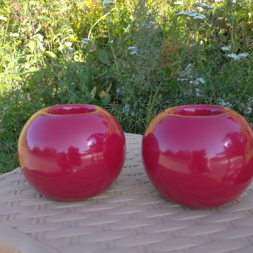 Set of two ceramic candlesticks like new, brick coral color