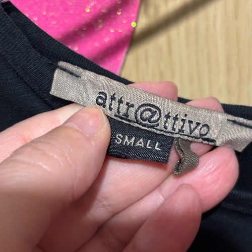 Attrattivo blouse like new, black, with large back opening, size S