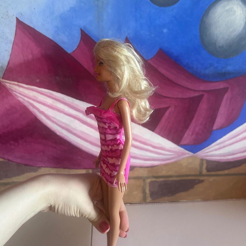 Mattel Barbie Beach doll with pink swimsuit and fuchsia dress