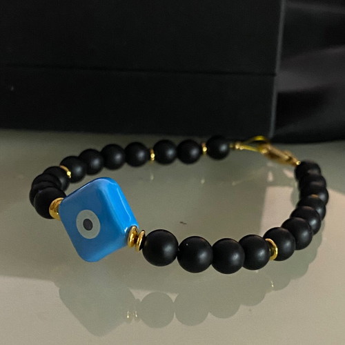 Handmade bracelet with haolite semi-precious stones and ceramic eye motif
