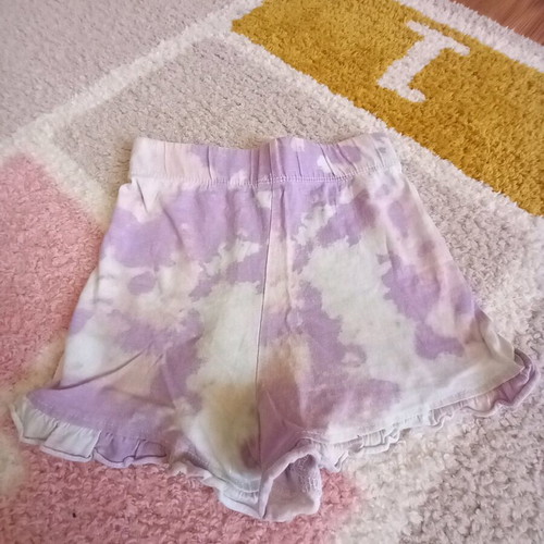 Children's summer pajama set used with sleeveless top and colorful purple shorts