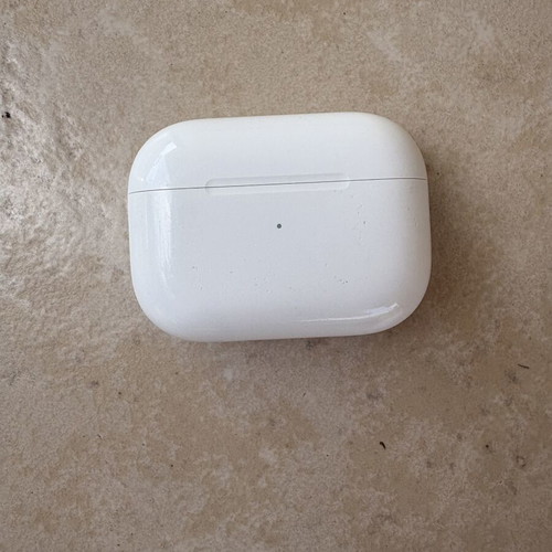 Apple AirPods Pro 2 left earbud with genuine lightning charging case