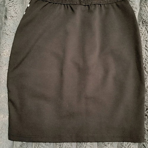 Actius mini skirt like new, black and white with triangular front opening