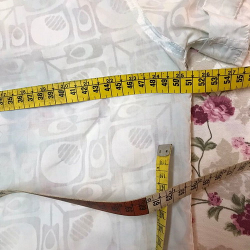 Women's shirt used, size small, transparent fabric, white
