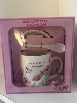 Cup with saucer and spoon new
