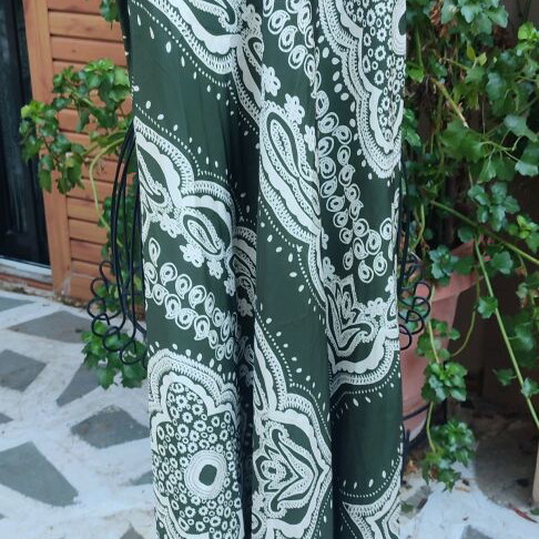 Long sleeveless dress dark green with white patterns, new, size S