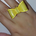 Yellow bow ring polymer in very good condition