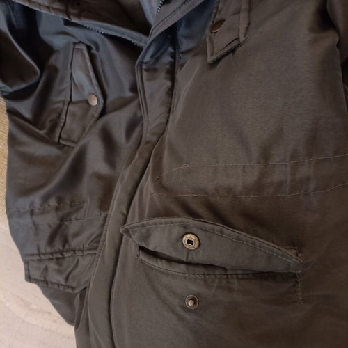 Men's jacket used, size large, with small defect