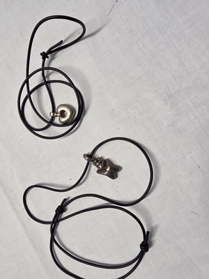 Necklaces with leather straps used, set of 2