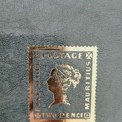 Stamp collection album like new, dark green leather-bound