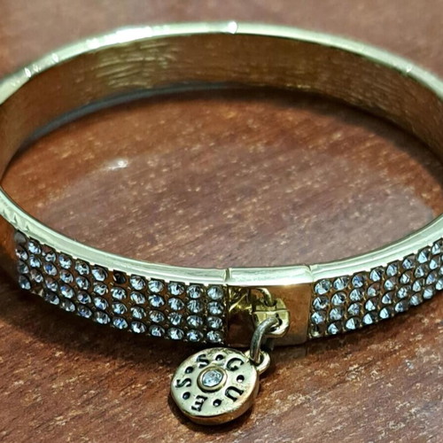 Guess women's bracelet, gold plated with missing stones