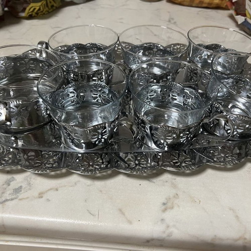 Coffee set with metal holders like new, includes tray and sugar bowl
