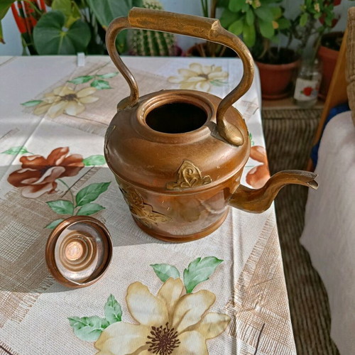 French teapot used with vintage brass decoration