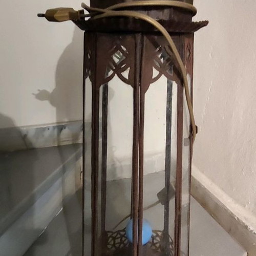 Metal vintage decorative garden lantern used with blue lighting