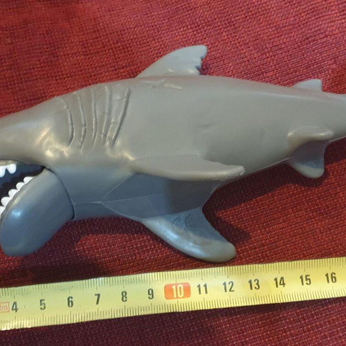Shark toy made of hard plastic with mouth mechanism like new