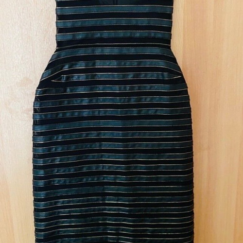 Dress black size M like new with gold details and leatherette