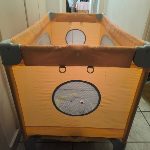 Chicco playpen bed like new with zipper side and mesh hole