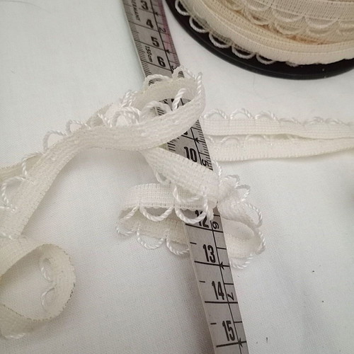 Elastic ribbon with loops like new, off-white-sugar color